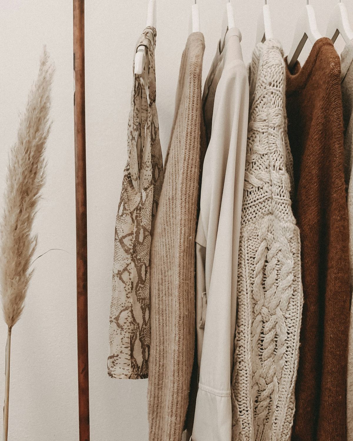 Finished knitwear hanging on a garment rail